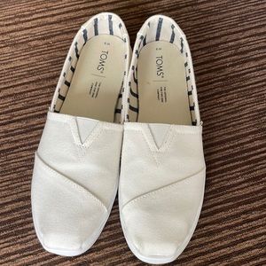 Toms white ladies slip on shoes size 9
